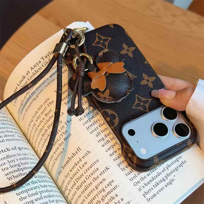 Luxury Monogram Case with Bow Charm & Wrist Lanyard 12-18 Pro & Pro Max