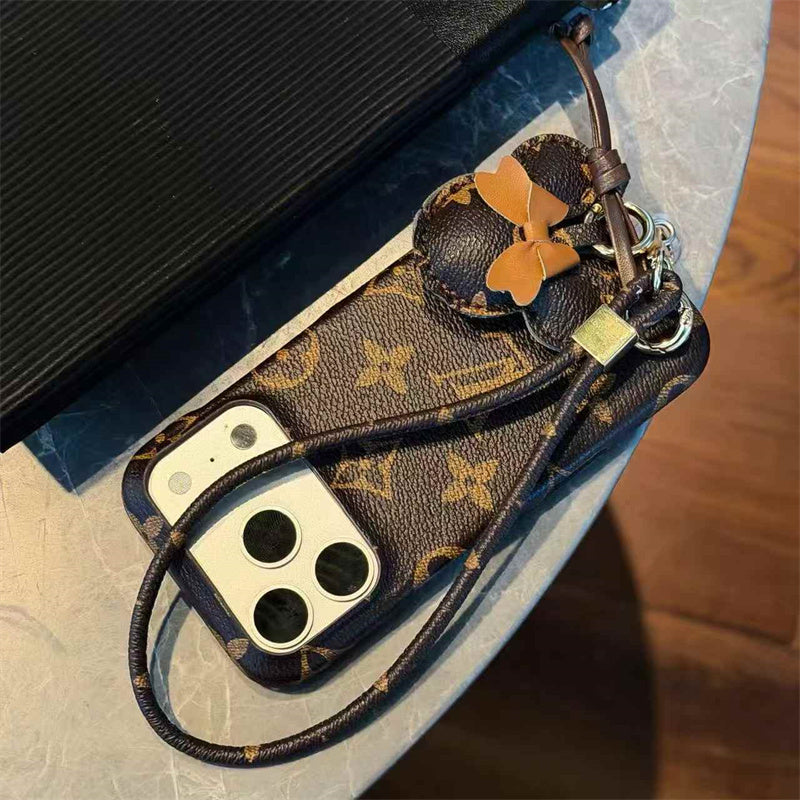 Luxury Monogram Case with Bow Charm & Wrist Lanyard 12-18 Pro & Pro Max